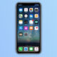 iPhone de face avec Face ID et fond bleu