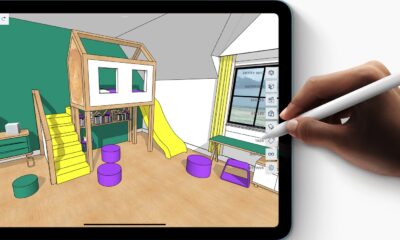 Main avec Apple Pencil entre les doigts et dessin sur iPad Air M1