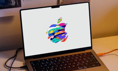 Fond d'écran MacBook avec fond gris et logo pomme croquée multicolore