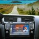 Carplay voiture paysage voyage min